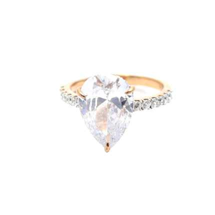 Sophisticated Pear-Cut Solitaire Rose Gold Pave Band Ring